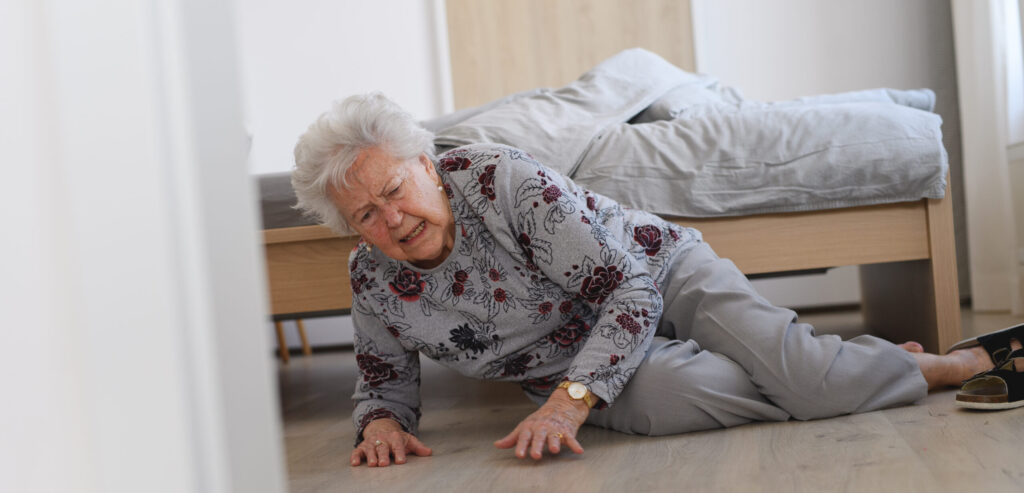Elderly woman tripped and fell from bed, injured herself, broke her hip.