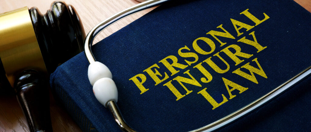 Personal Injury Law concept. Book and stethoscope.
